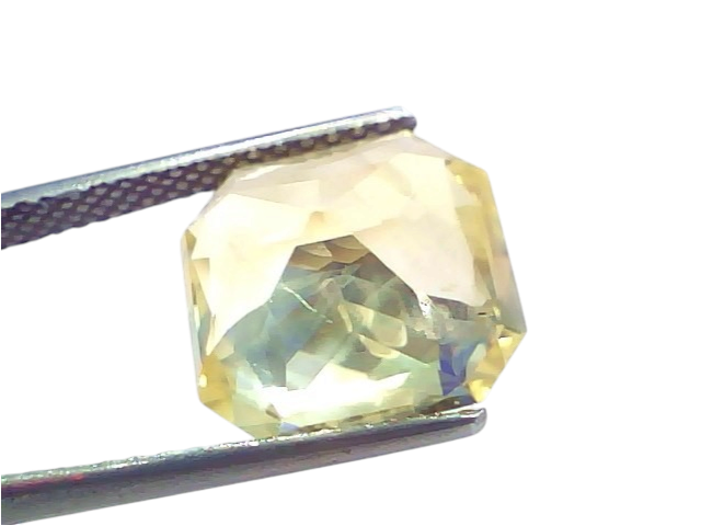 Huge 10.97 Ct IGI Certified Unheated Natural Ceylon Yellow Sapphire Pukhraj, octagonal cut, held with tweezers against a whit