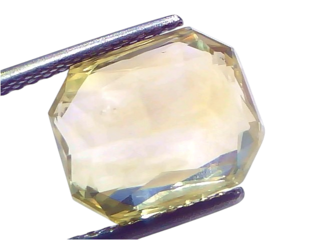 Huge 10.09 Carat IGI Certified Unheated Natural Ceylon Yellow Sapphire Pukhraj, octagonal cut, held with tweezers.