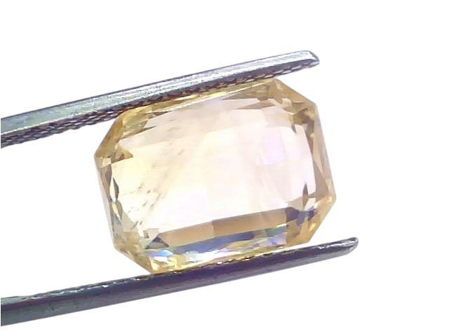 Huge 10.39 Ct IGI Certified Unheated Natural Ceylon Yellow Sapphire Pukhraj, displayed in tweezers against a white background