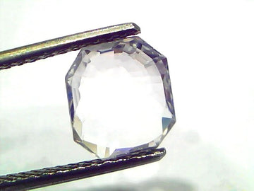 2.85 Ct Gii Certified Unheated Untreated Natural Ceylon White Sapphire, octagonal cut, held between tweezers, clear and spark