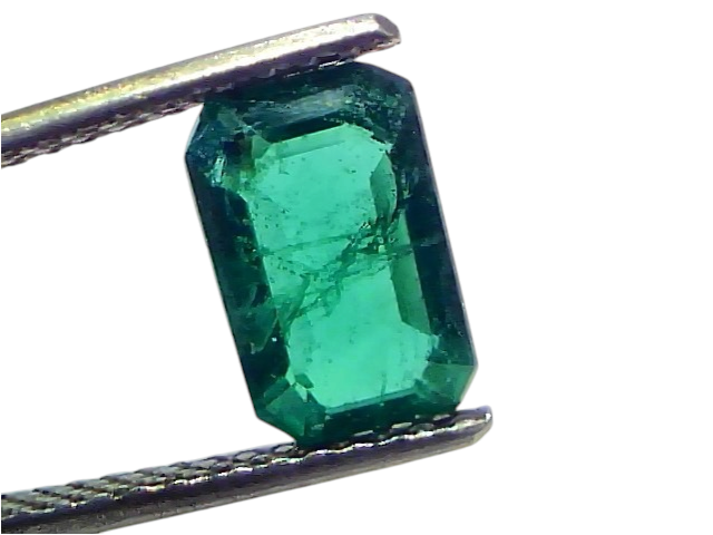 Natural Zambian emerald, 2.15 carats, untreated, octagonal cut, displayed between tweezers against a white background.