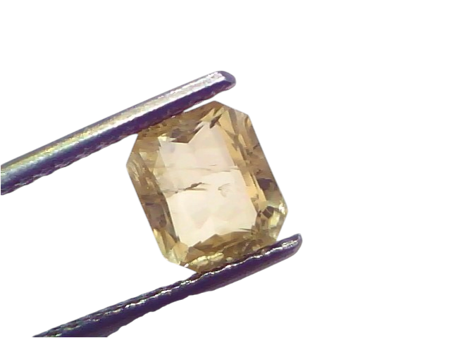 2.53 Ct Certified Unheated Natural Ceylon Yellow Sapphire Pukhraj displayed in tweezers, showcasing its radiant yellow hue an