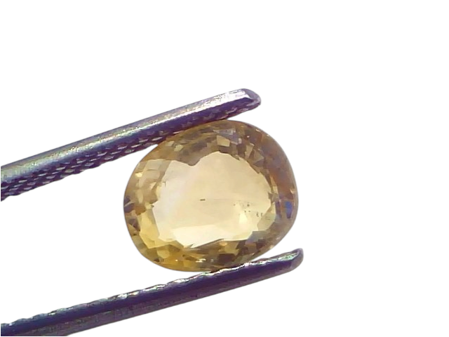 A 2.12 Ct certified unheated natural Ceylon yellow sapphire, held with tweezers, showcasing its oval cut and clarity.