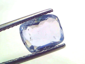 3.50 Ct Certified Unheated Untreated Natural Ceylon Blue Sapphire, displayed on tweezers, showcasing its clear blue hue and f