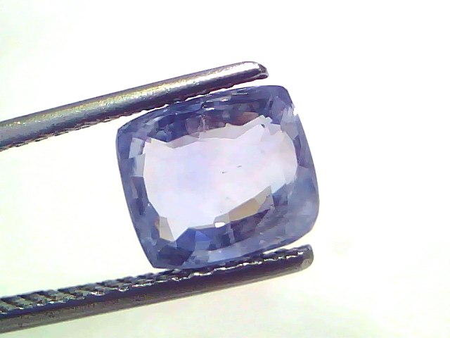 3.54 Ct Certified Unheated Untreated Natural Ceylon Blue Sapphire, displayed with tweezers against a white background.