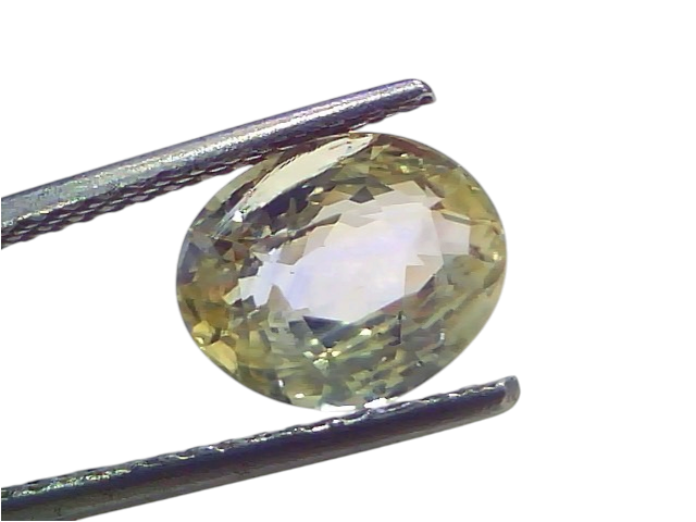 Oval-cut 3.65 Ct certified unheated natural Ceylon yellow-blue sapphire held by tweezers, showcasing its clarity and brillian