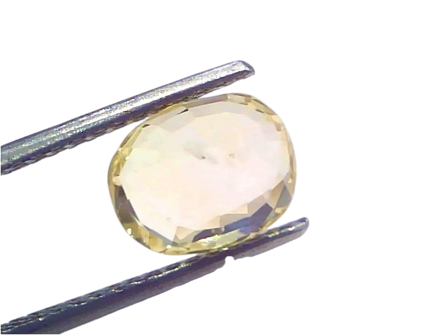 3.19 Ct IGI Certified Unheated Natural Ceylon Yellow Sapphire Pukhraj held in tweezers, showcasing its vibrant yellow hue and