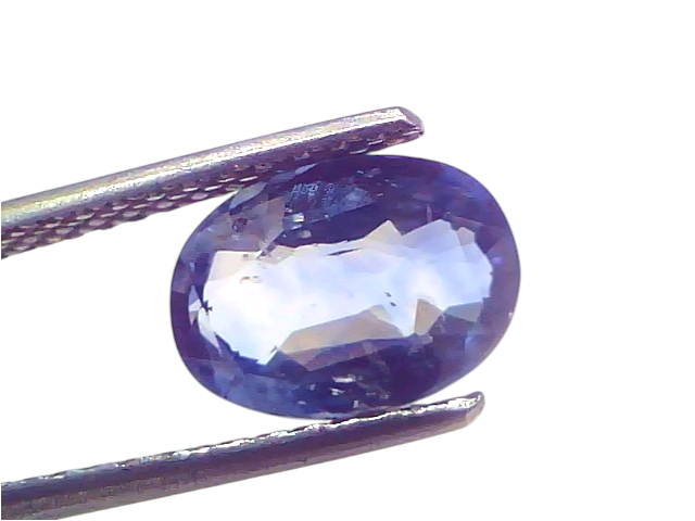 3.48 carat IGI certified unheated natural Ceylon blue sapphire held by tweezers, showcasing its deep blue color and clarity.