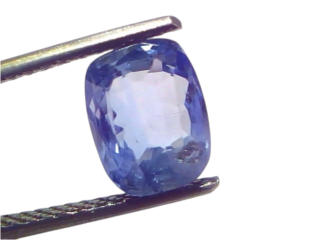 3.64 carat IGI certified unheated natural Ceylon blue sapphire, cushion cut, displayed in tweezers against a white background