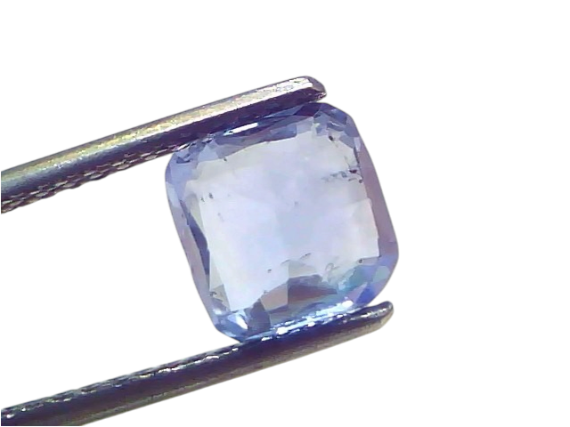 3.10 Ct Certified Unheated Untreated Natural Ceylon Blue Sapphire, displayed in tweezers, showcasing its vibrant blue color a