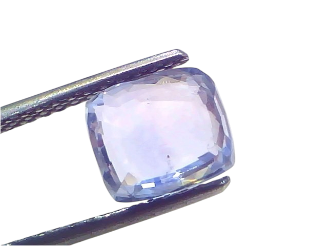 3.54 Ct Certified Unheated Untreated Natural Ceylon Blue Sapphire, displayed with tweezers against a white background.