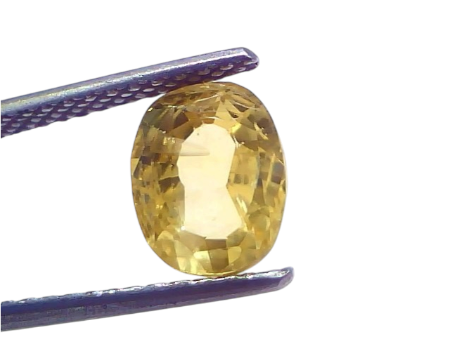 3.53 carat IGI certified unheated natural Ceylon yellow sapphire held by tweezers, showcasing its brilliant cut and vibrant y