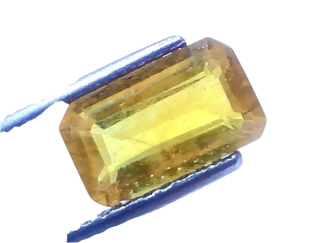 Natural yellow sapphire gemstone in an emerald cut, weighing 3.58 carats and 3.97 ratti, with a bright yellow hue.