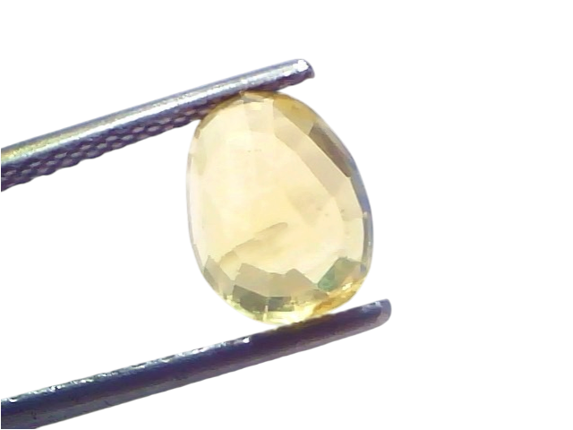3.53 carat IGI certified unheated natural Ceylon yellow sapphire held by tweezers, showcasing its vibrant yellow hue.