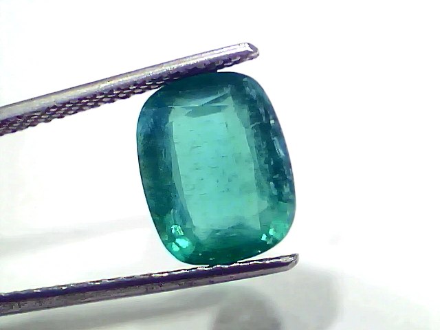 Natural Zambian Emerald by Venus Gems, 4.77 carats, untreated, GII certified, showcasing a vibrant green hue.