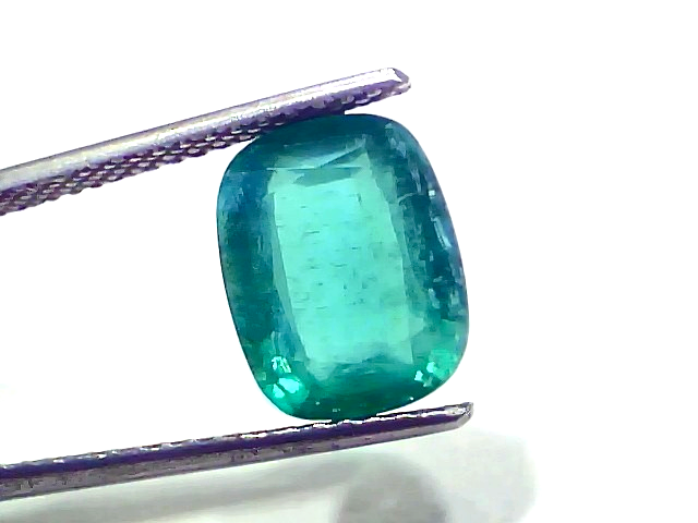 Natural Zambian Emerald by Venus Gems, 4.77 carats, untreated, GII certified, showcasing a vibrant green hue.