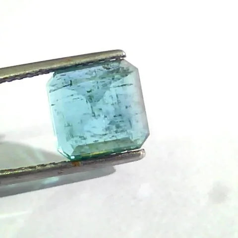 4.12 Ct Untreated Natural Zambian Emerald Gemstone Panna AAA, octagonal cut, vibrant green color, held by tweezers.