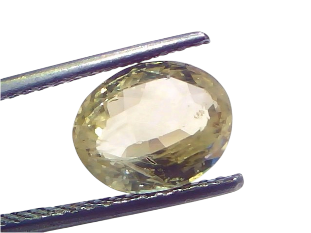 4.07 carat IGI certified unheated natural Ceylon yellow sapphire, oval cut, held with tweezers against a white background.