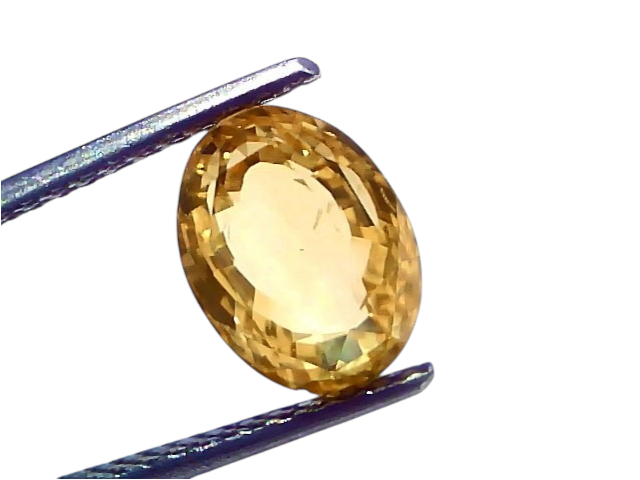 Oval-shaped 4.55 Ct IGI Certified Unheated Natural Ceylon Yellow Sapphire Pukhraj, displayed with tweezers against a light ba