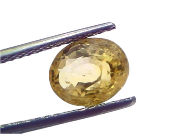 4.03 carat IGI certified unheated natural Ceylon yellow sapphire in a silver setting, showcasing its brilliant cut and color.