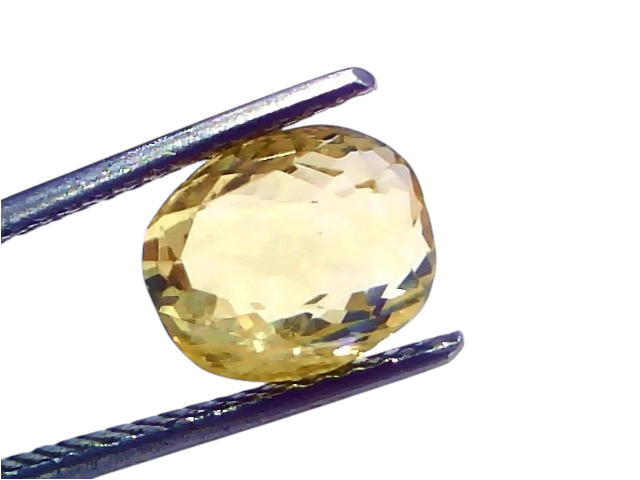4.96 Ct IGI Certified Unheated Natural Ceylon Yellow Sapphire Pukhraj, oval cut, held between tweezers, showcasing its brilli