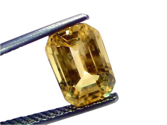 4.06 Ct IGI Certified Unheated Natural Ceylon Yellow Sapphire Pukhraj AAA, emerald cut, displayed on a tweezer against a whit