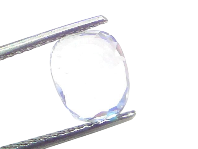 Venus Gems 4.09 carat unheated cushion-cut natural white sapphire gemstone held in metal tweezers.
