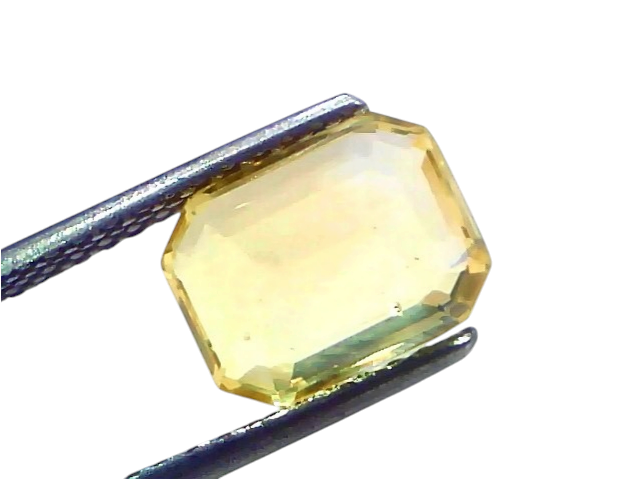 4.04 Ct IGI Certified Unheated Natural Ceylon Yellow Sapphire Pukhraj AAA, octagonal cut, vibrant yellow color, held by tweez