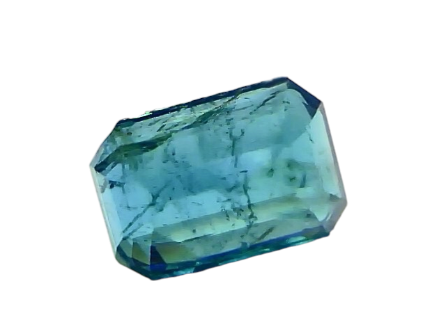 Natural Zambian emerald, 4.44 carats, octagonal cut, showcasing deep green hues and clarity, held by tweezers.