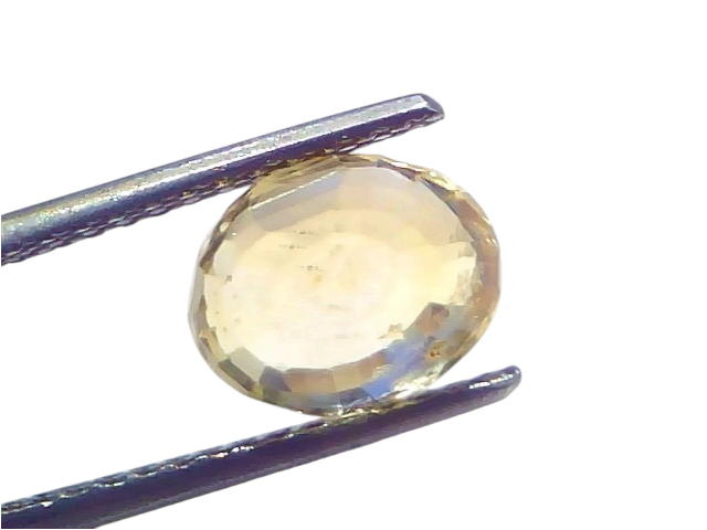 4.03 carat IGI certified unheated natural Ceylon yellow sapphire in a silver setting, showcasing its brilliant cut and color.