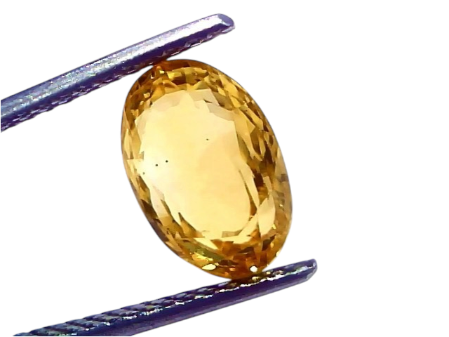 Venus Gems 4.60 carat unheated natural Ceylon yellow sapphire held in tweezers, showing vivid yellow color and clarity.