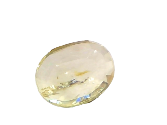 4.07 Ct Certified Unheated Natural Ceylon Yellow Sapphire Pukhraj displayed with tweezers, showcasing its oval cut and vibran