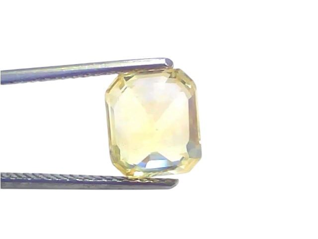 5.02 carat GII certified Ceylon yellow sapphire Pukhraj stone, octagonal cut, held with tweezers against a white background.