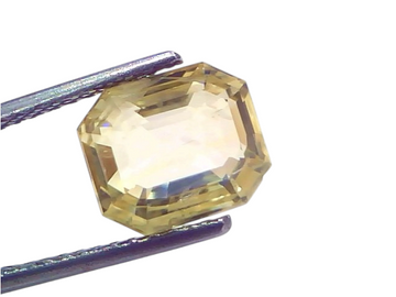 5.26 Ct IGI Certified Unheated Natural Ceylon Yellow Sapphire Pukhraj in an octagonal cut, showcasing a vibrant yellow hue.