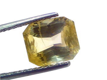 5.74 Ct IGI Certified Unheated Natural Ceylon Yellow Sapphire Pukhraj, octagonal cut, showcasing vibrant yellow hues.