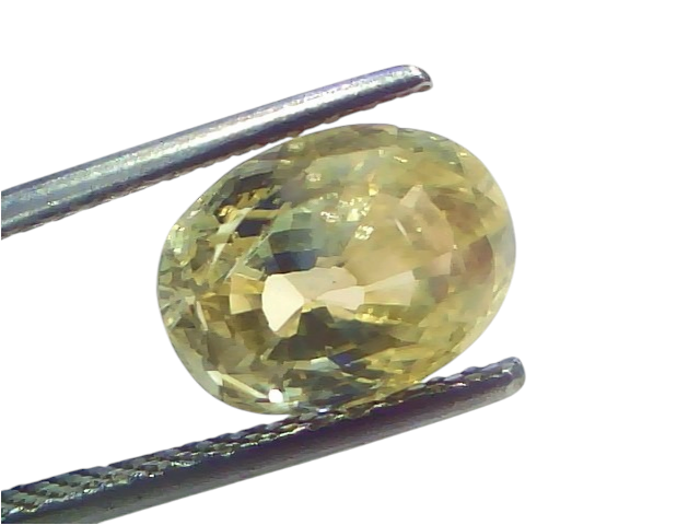 5.00 Ct IGI Certified Unheated Natural Ceylon Yellow Sapphire Pukhraj, oval-cut gemstone held with tweezers, showcasing its b