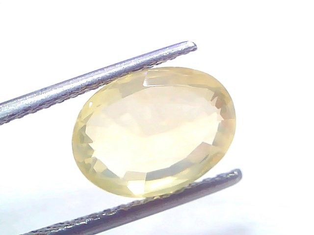 Venus Gems 5.28 carat unheated oval mixed cut natural yellow sapphire gemstone from Ceylon with excellent luster
