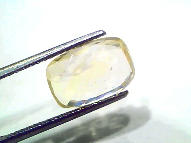 6.00 Carat Ceylon Natural Yellow Sapphire Pukhraj, unheated, with a rectangular cut and a light yellow hue.