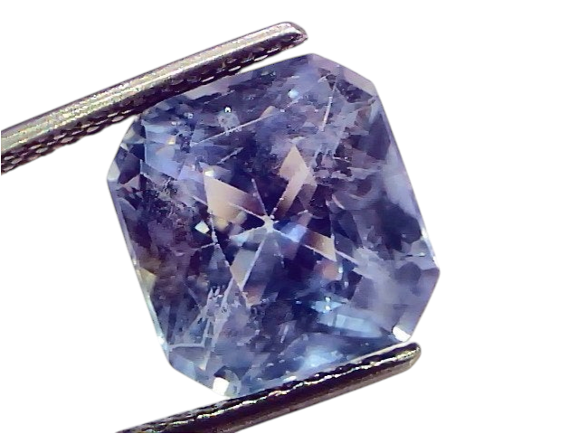 9.76 carat IGI certified unheated natural Ceylon blue sapphire, octagonal cut, showcasing a vibrant blue hue.