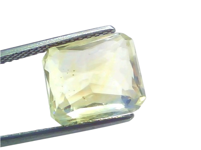 9.11 Ct IGI Certified Unheated Natural Ceylon Yellow Sapphire Pukhraj displayed in tweezers, showcasing its brilliant cut and